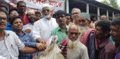 শেরপুরে বানভাসিদের পাশে - এম পি হাবিব